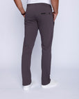 men’s charcoal workout pants worn by male model, back full-body view showing clean rear pocket design.
