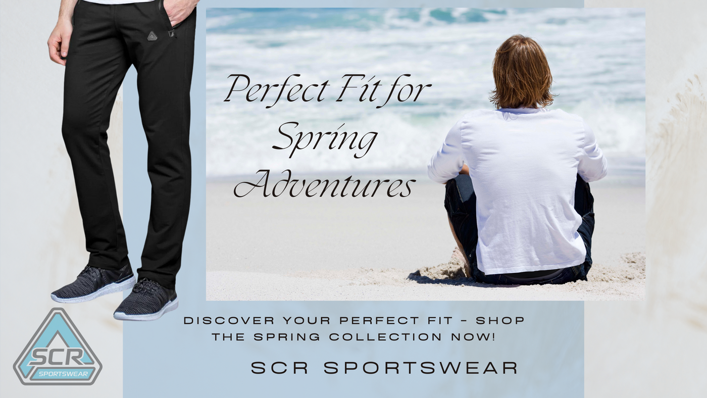 Man seated on the beach looking at the ocean wearing SCR Sportswear's tall slim-fit black sweatpants and casual white long-sleeve shirt - Spring Collection