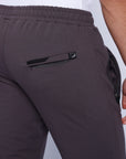 close-up of tall men’s charcoal athletic lounge sweatpants with zipper pocket
