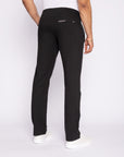 Person wearing black pants on a white background