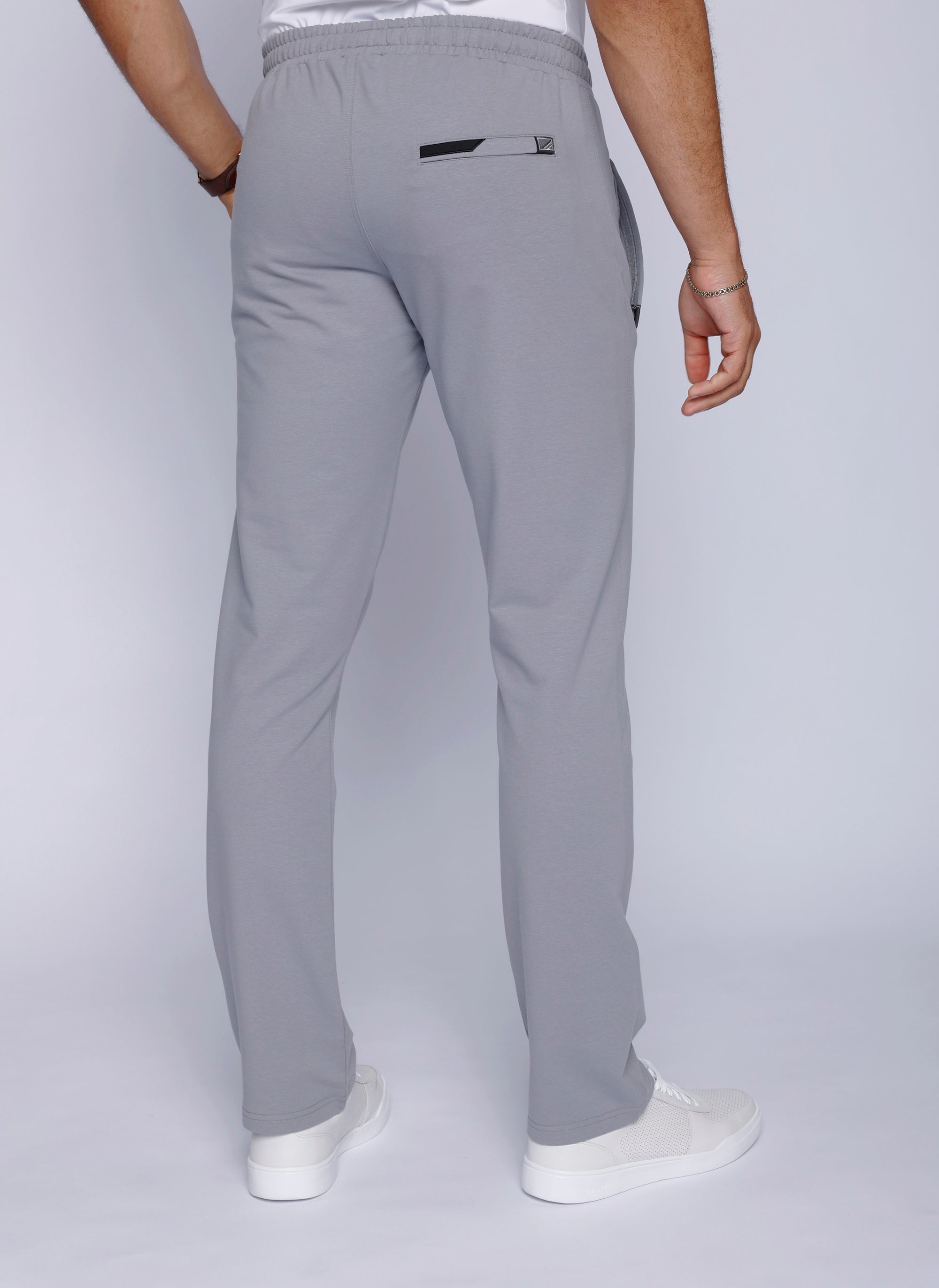 tall men’s grey athletic sweatpants with long inseam and secure back zipper pocket, back view
