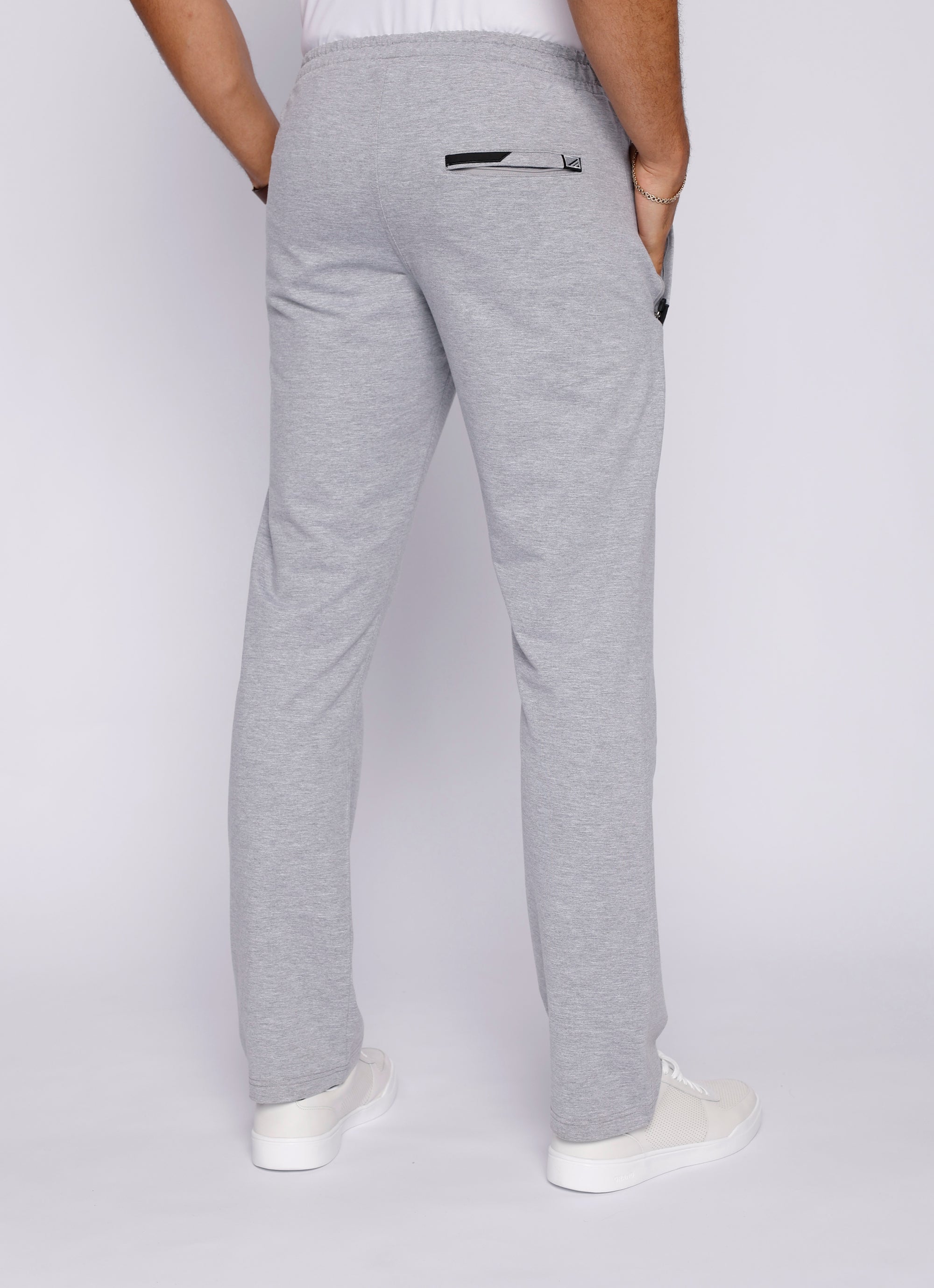 tall men’s light grey athletic sweat pants with long inseam and back zipper pocket, back view