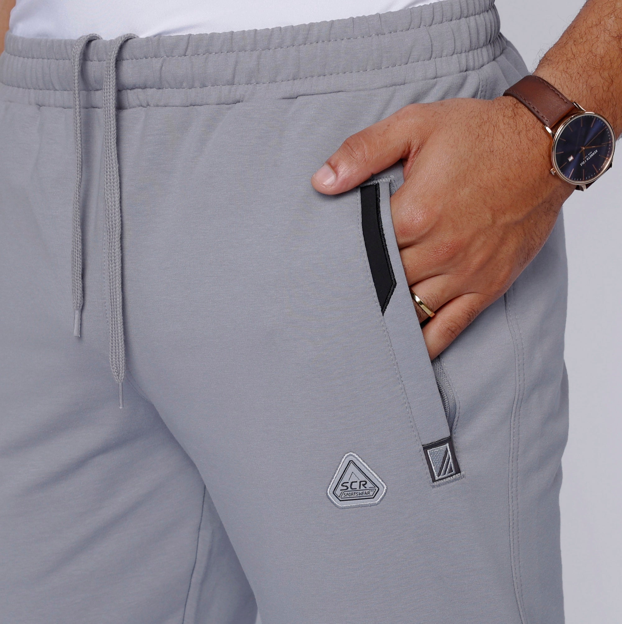  close-up of big and tall light grey sweatpants with zipper pocket and waistband