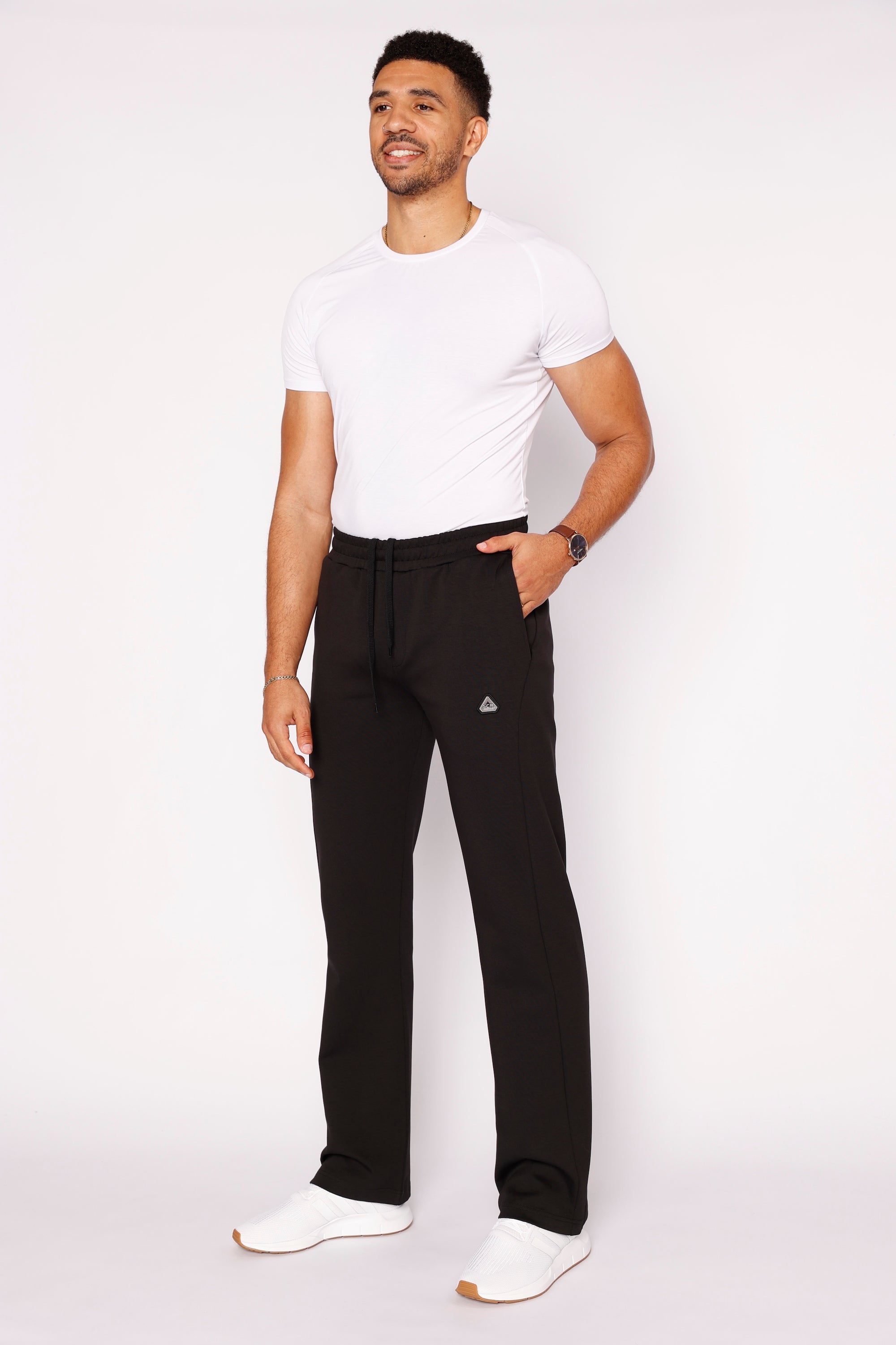 Men wearing black straight leg athletic pants in a relaxed, comfortable fit suitable for everyday and active use - SCR Sportswear
